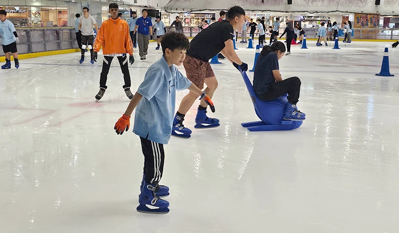 Children ice skating at Paradigm Mall