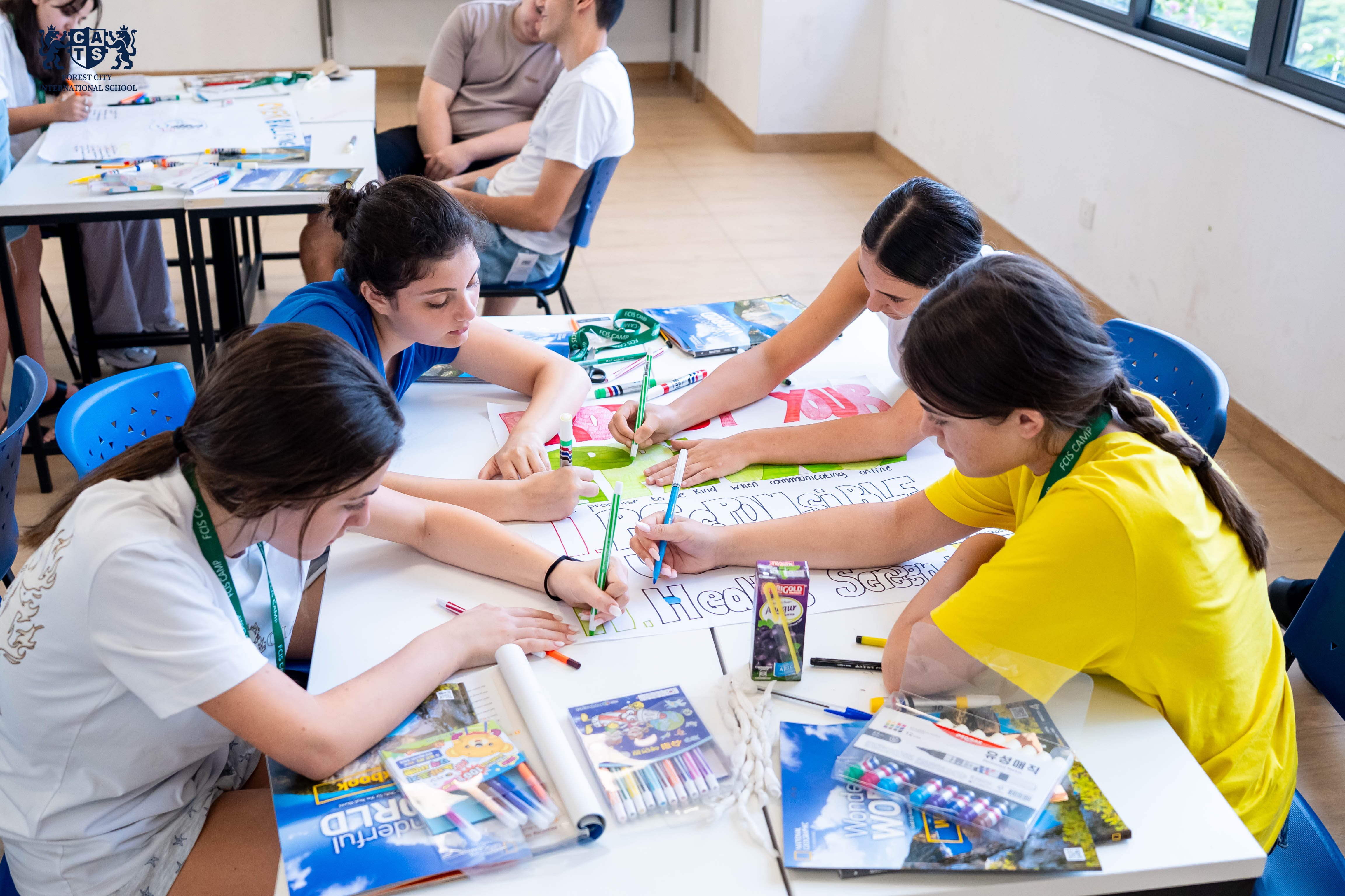 Campers collaborating on a project-based learning activity